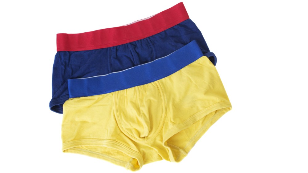 two pairs of men's briefs; one is yellow with a blue waistband and one is blue with a red waistband