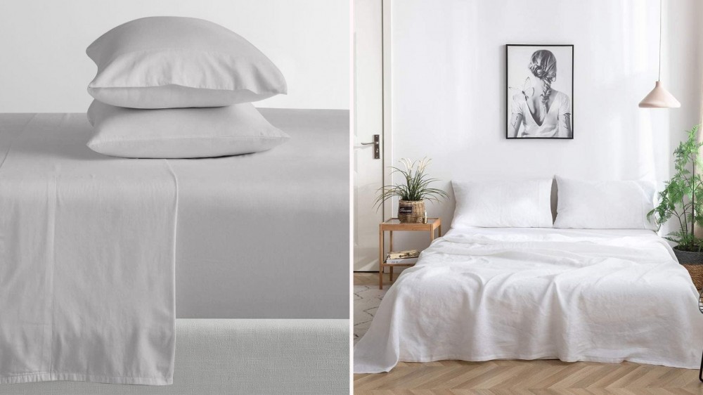 A set of light gray bedding; a bed made with white sheets